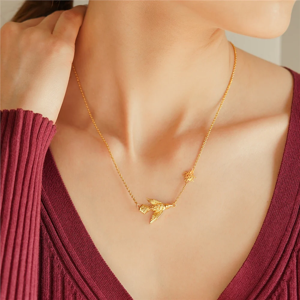 Gold Plated Necklace with Bird and Sun Charm - Image 2